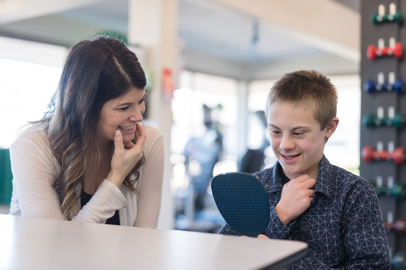 speech therapist teaching a kid