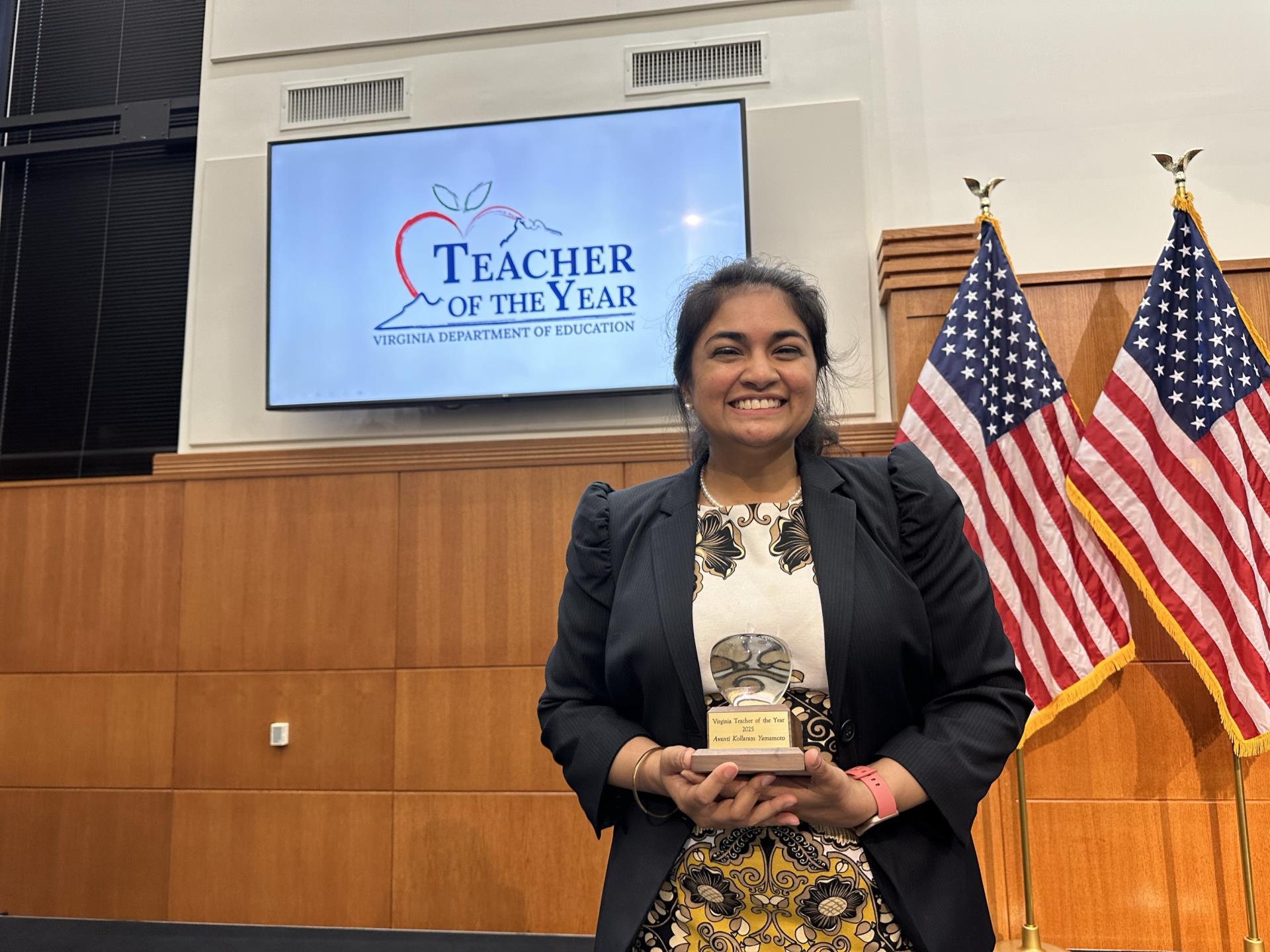 Avanti Yamamoto holds Teacher of the Year Award