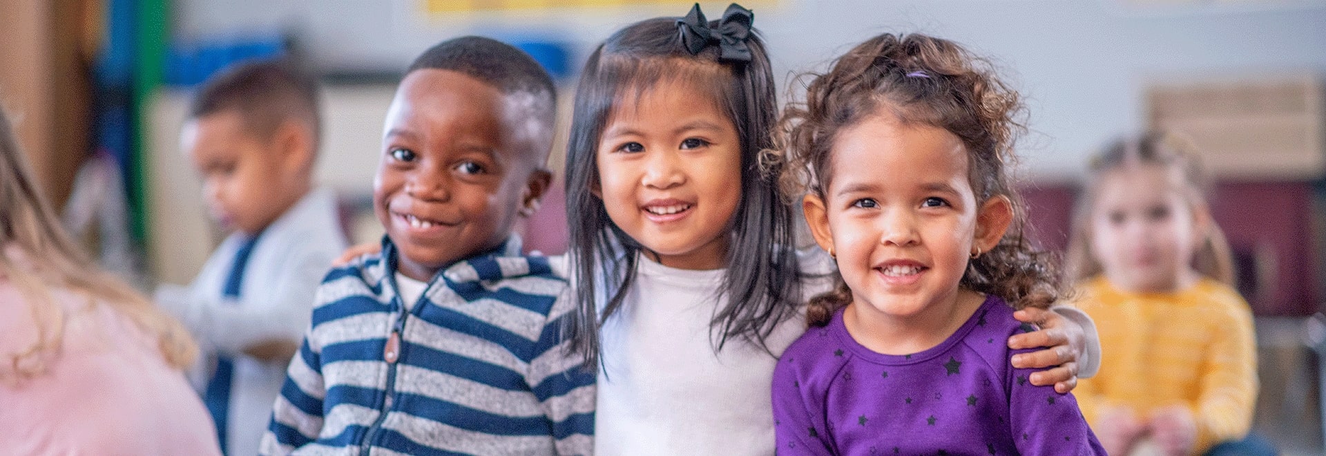 three children smiling