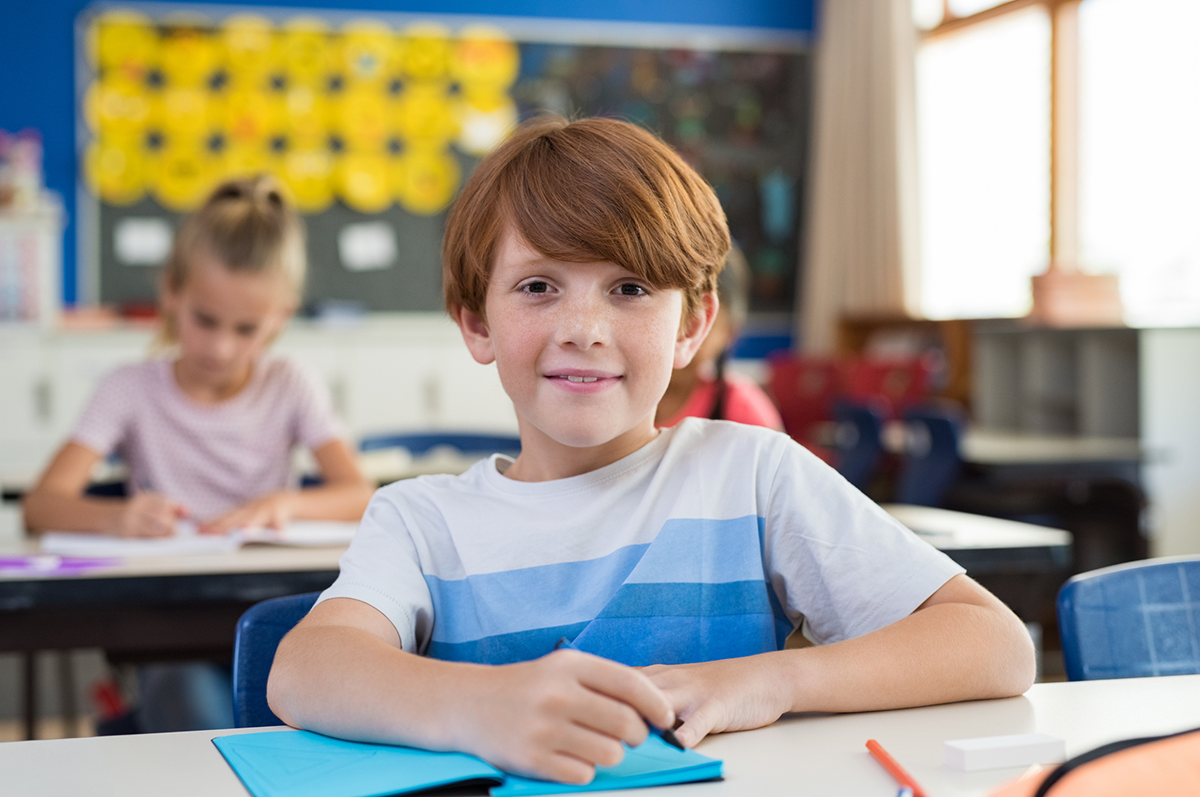 elementary student at desk